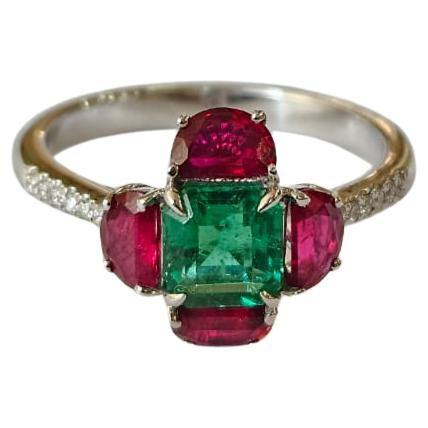 Set in 18K Gold, Zambian Emerald, Mozambique Ruby 
Diamonds Engagement Ring For Sale