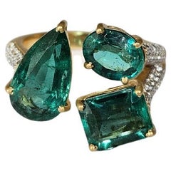 Set in 18K Matte Gold, 5.90 carats Zambian Emerald & Diamonds Three stone Ring