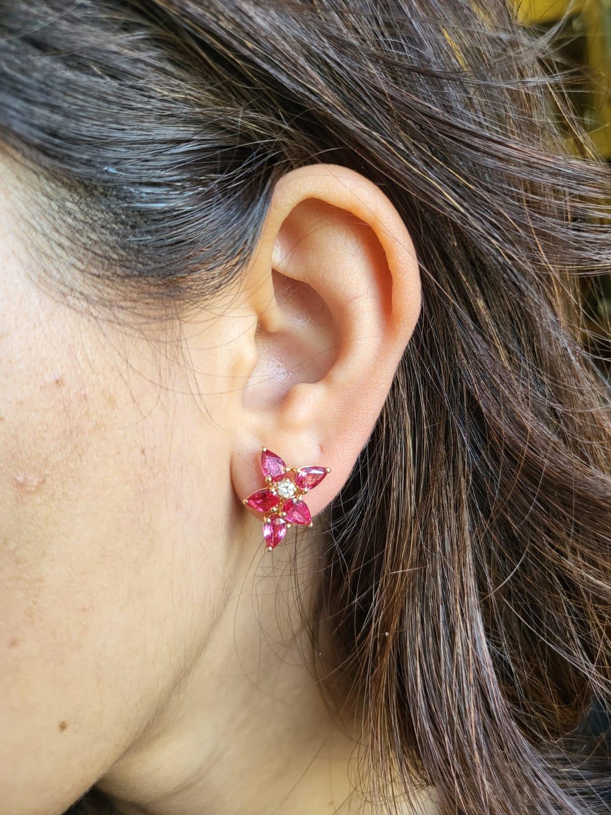 A very dainty and beautiful pair of Ruby Stud Earrings set in 18K Rose Gold & Diamonds. The weight of the Rubies is 4.02 carats. The Rubies are completely natural, without any treatment and is of Mozambique origin. The weight of the Diamonds is 0.15
