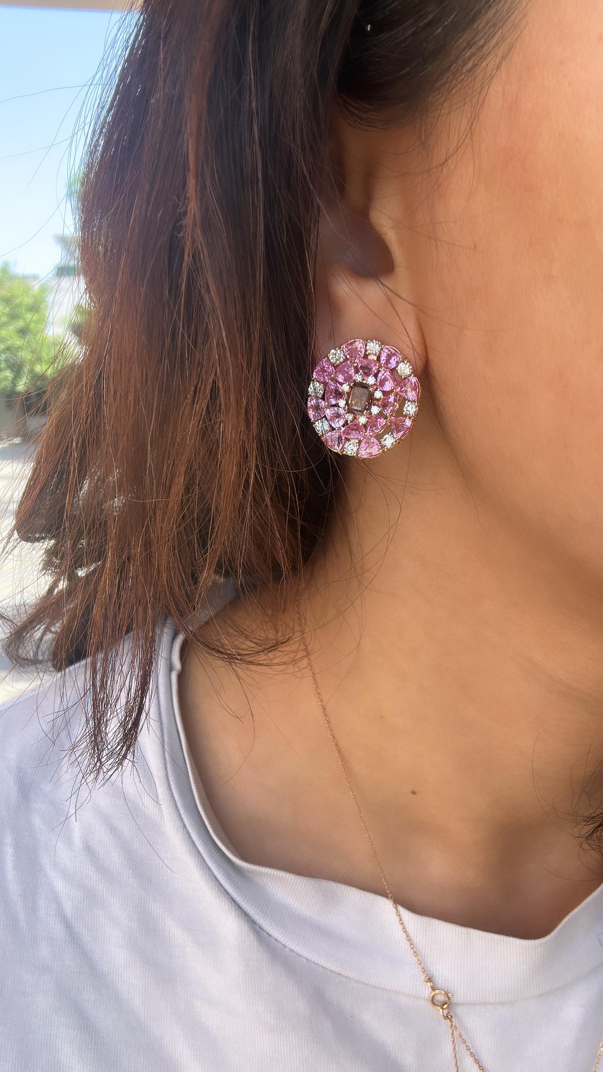 A very gorgeous and beautiful, Pink Sapphire Stud Earrings set in 18K Rose Gold & Diamonds. The weight of the Pink Sapphires is 8.96 carats. The Pink Sapphires are of Ceylon (Sri Lankan) origin. The combined weight of the Diamonds is 3.18 carats.