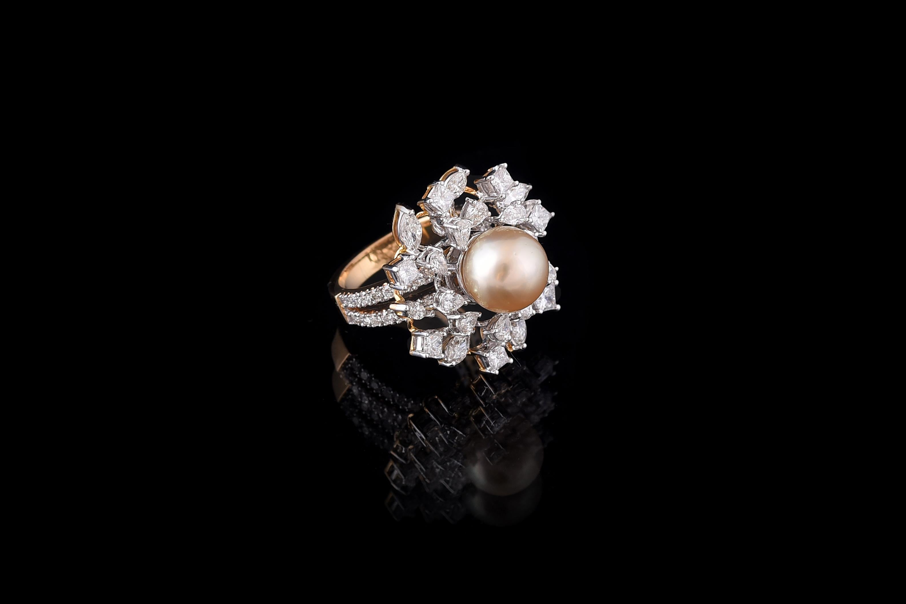 A classic Pearl and Diamond Cocktail Ring, set in 18K white and rose gold. The pearl is natural, fresh water, and weighs 6.74 carats. The weight of the diamonds is 2.94 carats. The ring is made in Indian ring size 12 (US size 6), and can be changed