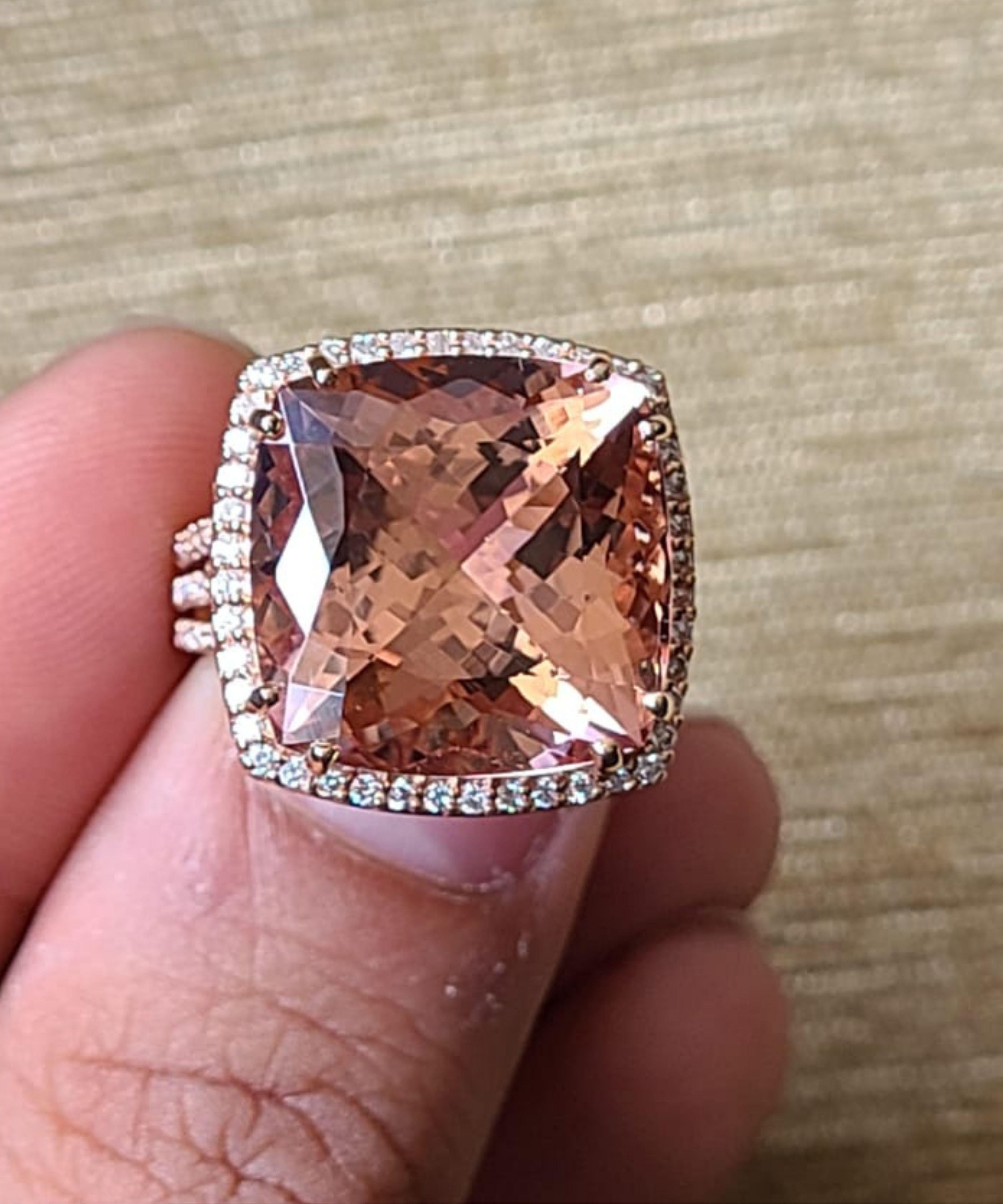 A very gorgeous and one of a kind, Morganite Engagement / Cocktail Ring set in 18K Rose Gold & Diamonds. The weight of the Morganite is 15.96 carats. The Morganite is peach in colour and is natural, without any treatment. The weight of the Diamonds