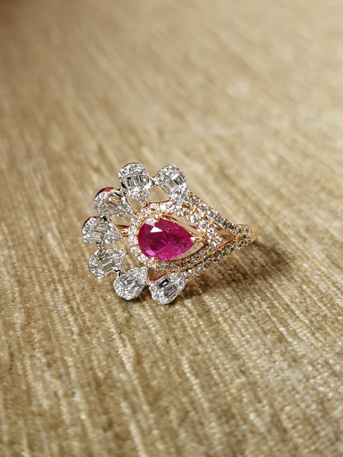 A very gorgeous and one of a kind, Ruby Cocktail/ Engagement Ring set in 18K Rose Gold & Diamonds. The weight of the Ruby is 0.64 carats. The Ruby is completely natural, without any treatment and is of Mozambique origin. The weight of the Diamonds