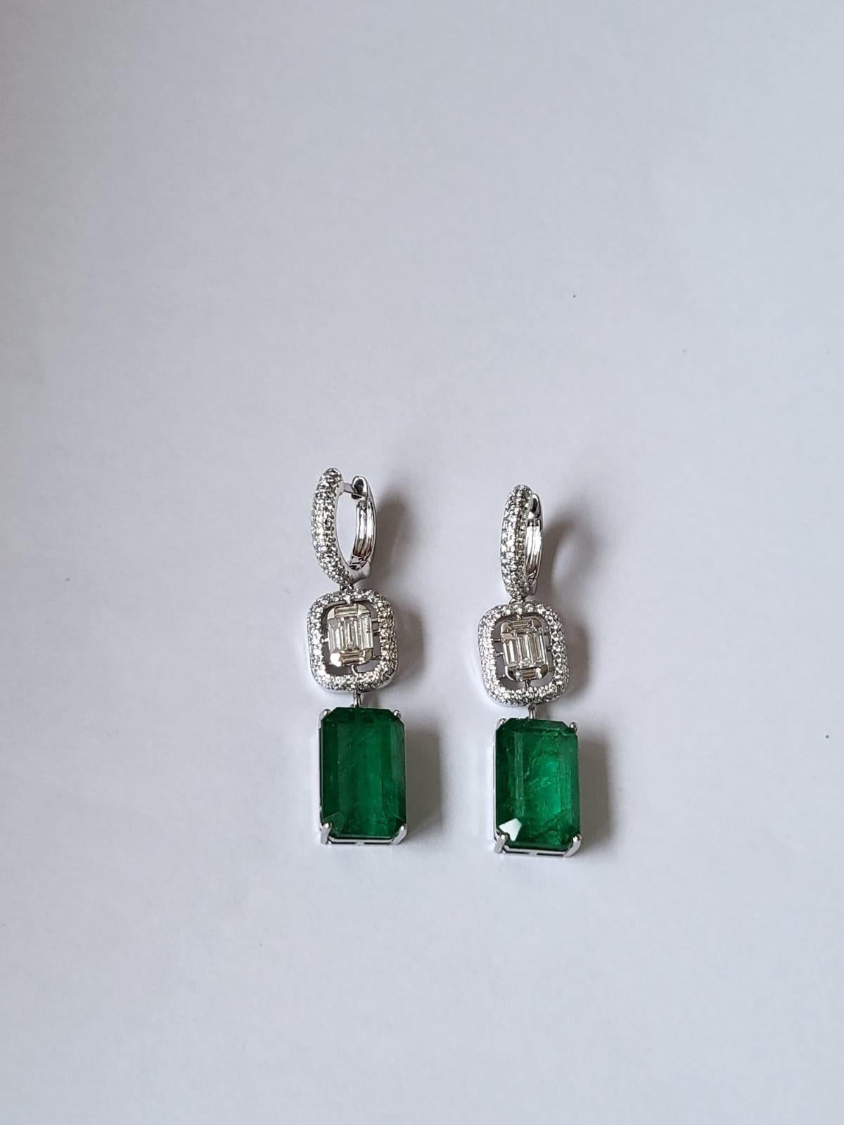A very beautiful and useful, Emerald Dangle Earring set in 18K Rose Gold & Diamonds. The weight of the Emeralds is 17.57 carats. The combined weight of the Diamonds is 17.57 carats. The Emeralds are completely natural, without any treatment and is