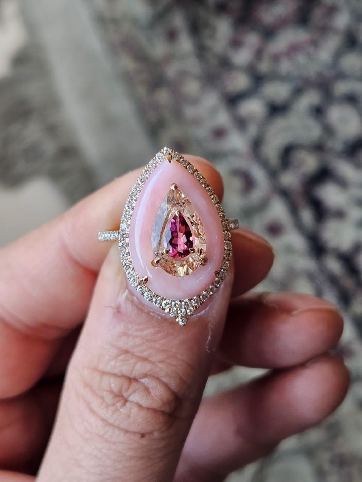 A very stunning and gorgeous, Pink Opal, Morganite, & Tourmaline Cocktail Ring set in 18K Rose Gold & Diamonds. The weight of the Pink Opal is 3.73 carats. The weight of the Morganite is 1.34 carats. The weight of the Tourmaline is 0.27 carats. The