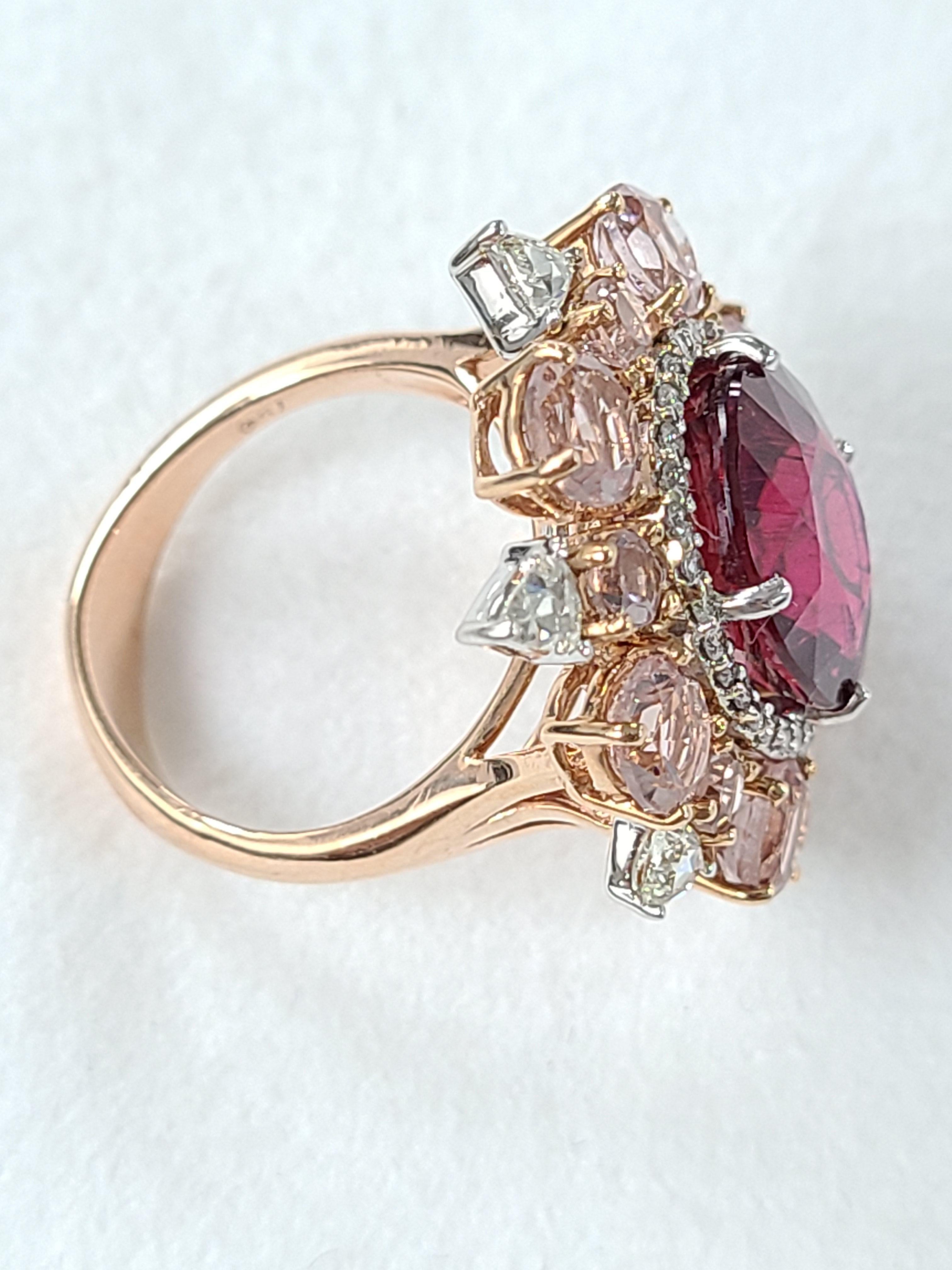 A beautiful ring set with rubellite and morganite combination with diamonds . rubylite weight is 8.23 carats and morganite weight is 3.65 carats with diamond weight of .94 carats . US ring size 6 1/2.