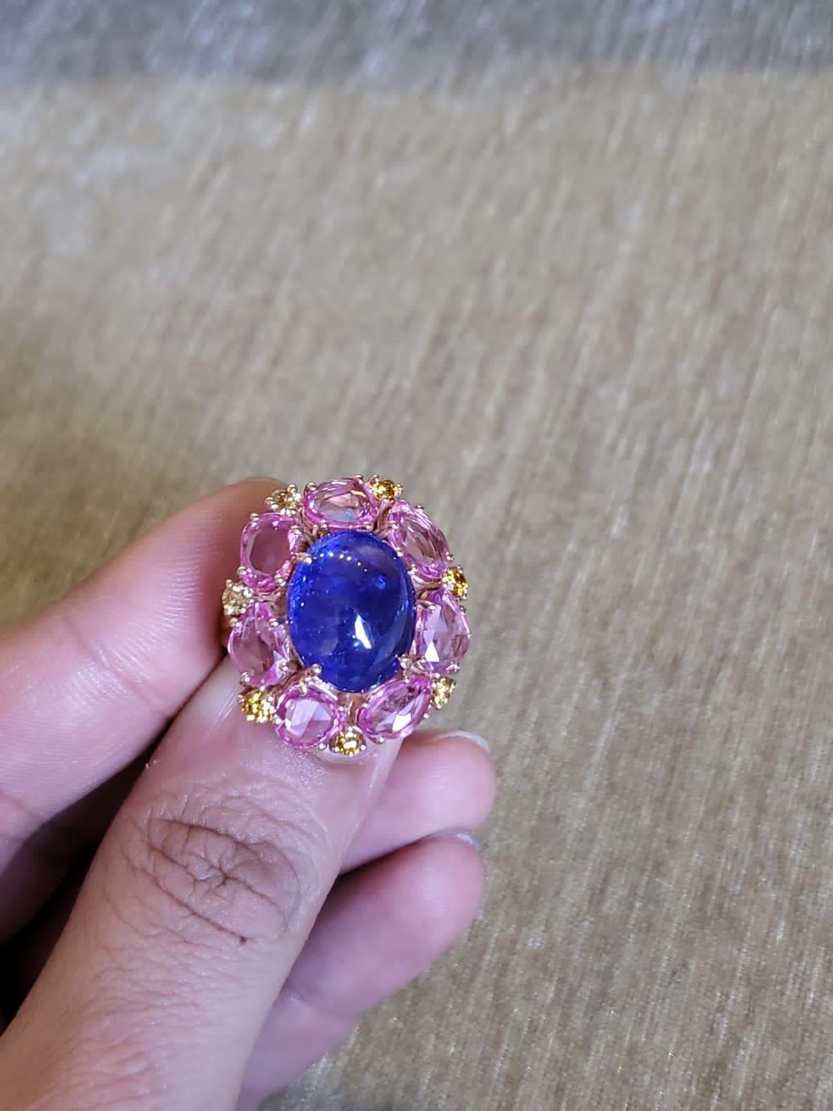 Set in 18K Gold, Tanzanite Cabochon, Pink Sapphires & Diamonds Cocktail Ring In New Condition In Hong Kong, HK