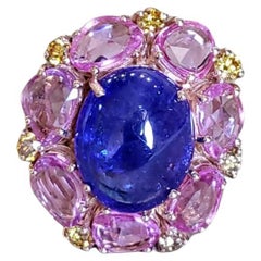 Anello da cocktail in oro 18 carati, tanzanite cabochon, zaffiri rosa e diamanti