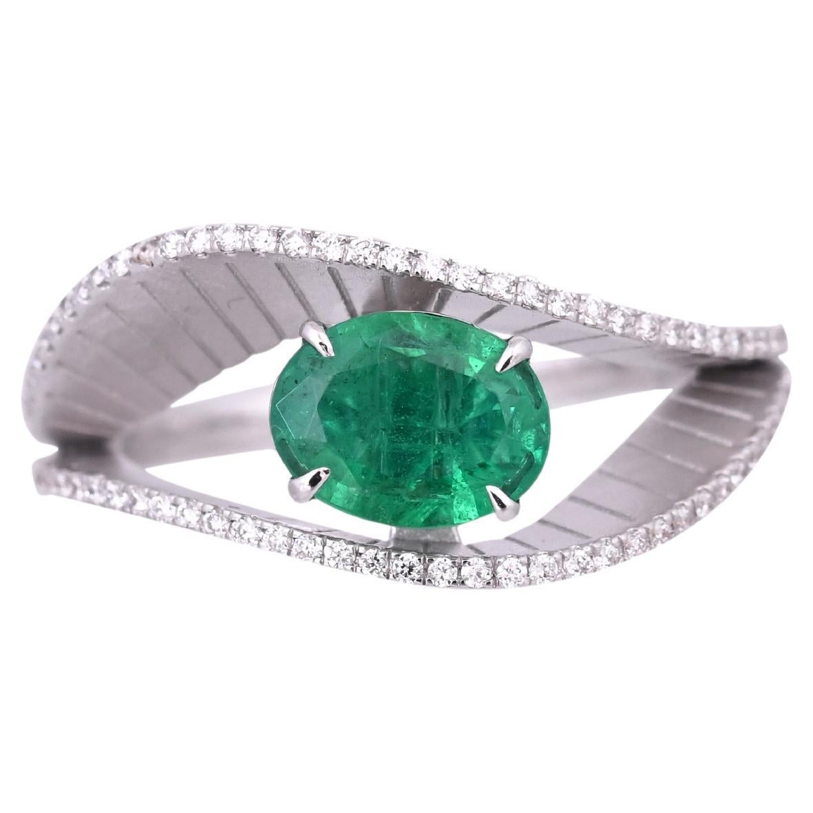 Set in 18K White Gold, 0.92 carats Zambian Emerald & Diamonds Engagement Ring
