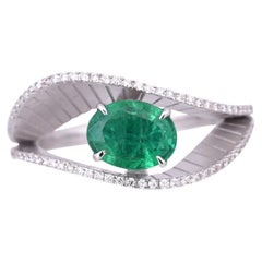 Set in 18K White Gold, 0.92 carats Zambian Emerald & Diamonds Engagement Ring