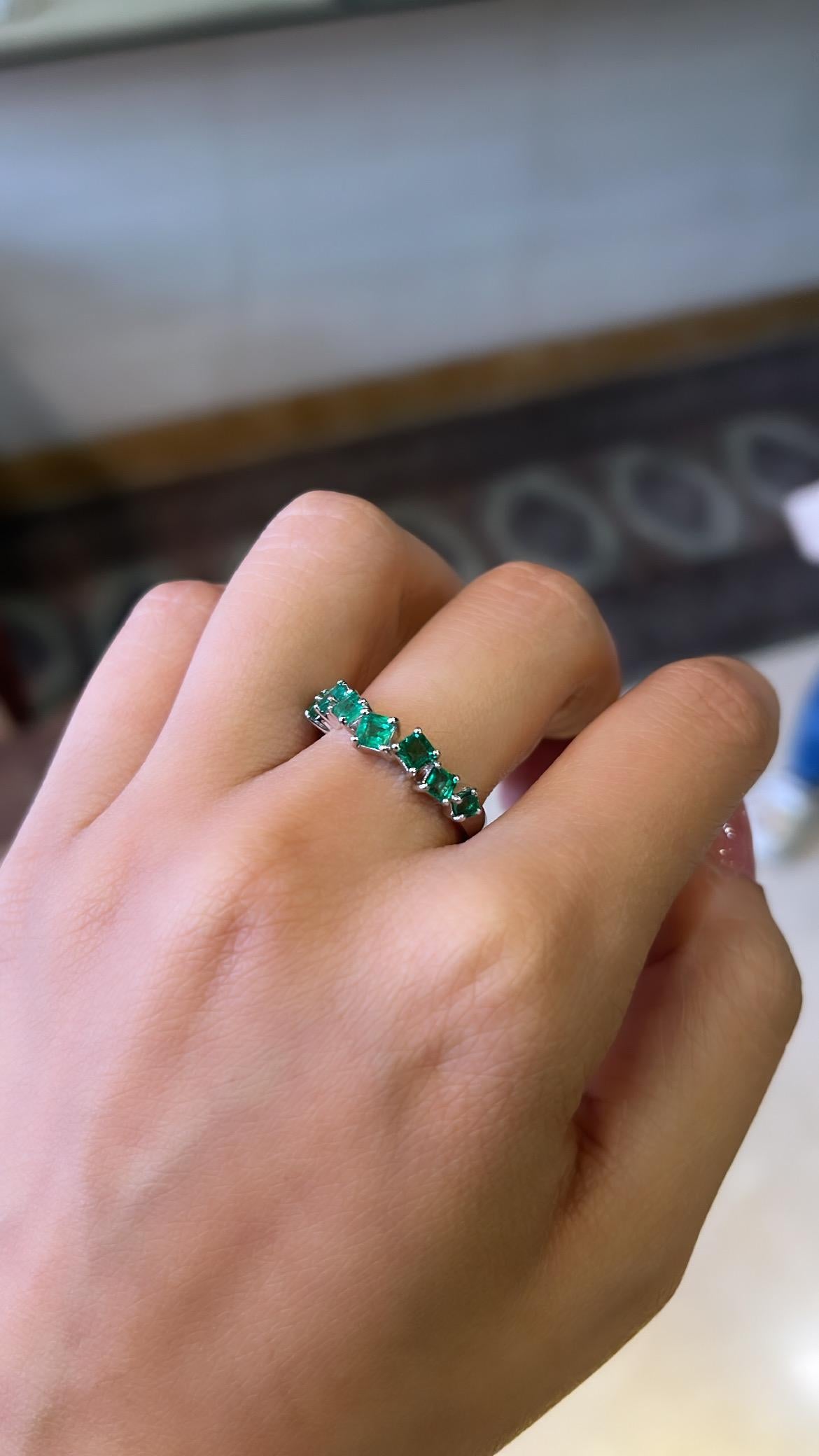 A very gorgeous Emerald Band Ring set in 18K White Gold. The weight of the Emeralds is 1.02 carats. The Emeralds are completely natural, without any treatment and are of Zambian origin. Net Gold weight is 3.45 grams. The dimensions of the ring are