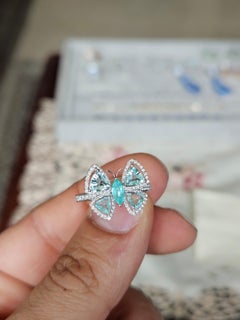 Set in 18K white gold, 1.14 carat, Paraiba Tourmaline & Diamonds Engagement Ring