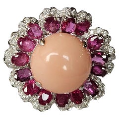 Set in 18K White Gold, 12.10 carats Coral, Rubies
Diamonds Cocktail Dome Ring Set in 18K White Gold, 12.10 carats Coral, Rubies
Diamonds Cocktail Dome Ring
