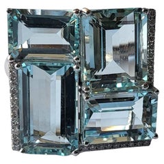 Set in 18k White Gold, 12.68 Carats Aquamarine and Diamonds Cocktail/Custer Ring