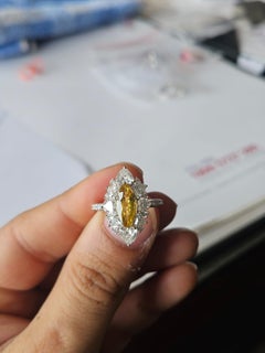 Set in 18K white Gold, 1.66 carats Yellow Sapphire & Diamonds Engagement Ring