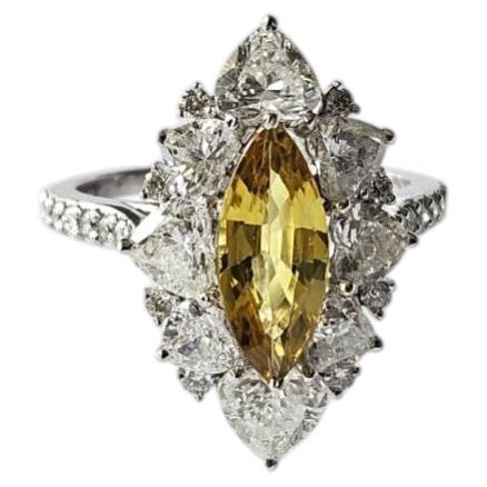 Set in 18K white Gold, 1.66 carats Yellow Sapphire & Diamonds Engagement Ring For Sale