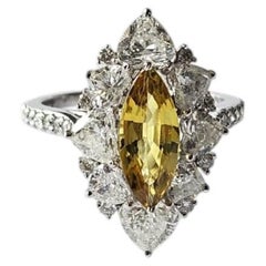 Set in 18K white Gold, 1.66 carats Yellow Sapphire & Diamonds Engagement Ring