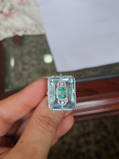 Set in 18K white Gold, 22.46 carat Aquamarine, Emerald & Diamond Engagement Ring