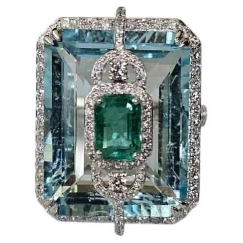 Set in 18K white Gold, 22.46 carat Aquamarine, Emerald & Diamond Engagement Ring For Sale