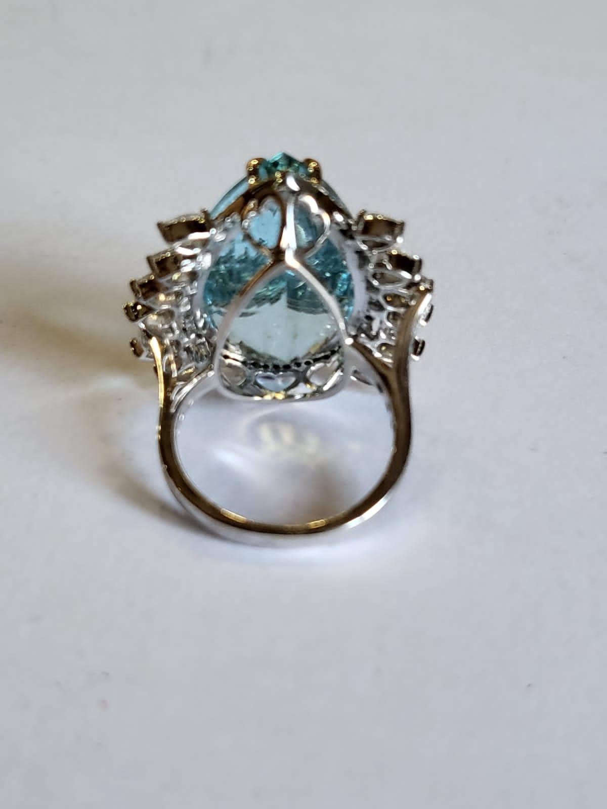 Aesthetic Movement Set in 18K White Gold, 26.69 carats Aquamarine & Rose Cut Diamonds Cocktail Ring For Sale