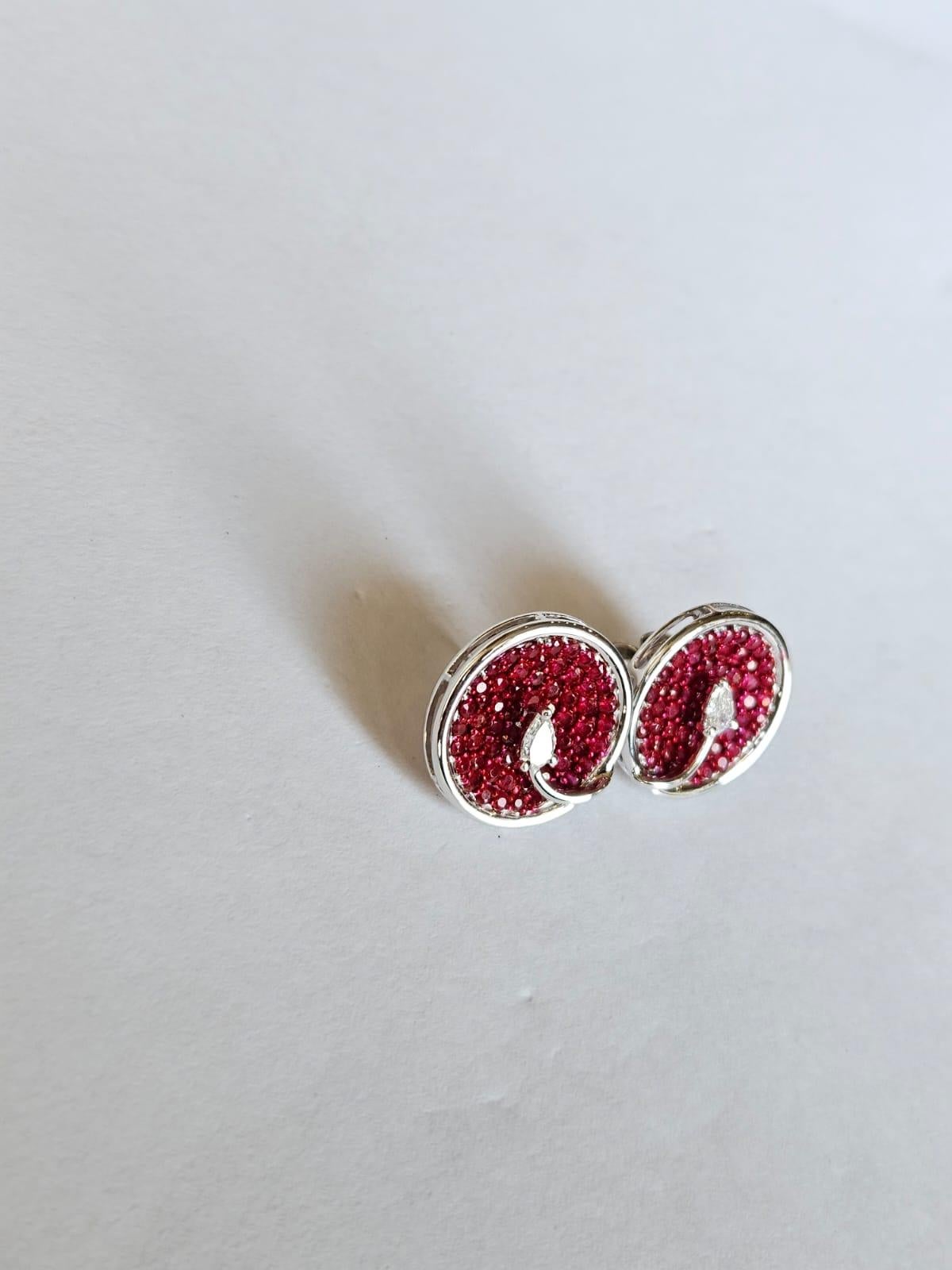 Pear Cut Set in 18K white Gold, 2.67 carats Rubies & Pear Diamonds Stud Earrings For Sale