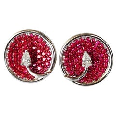 Set in 18K white Gold, 2.67 carats Rubies & Pear Diamonds Stud Earrings