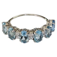 Set in 18K white Gold, 2.74 carat, Aquamarines & Diamonds Band Engagement Ring