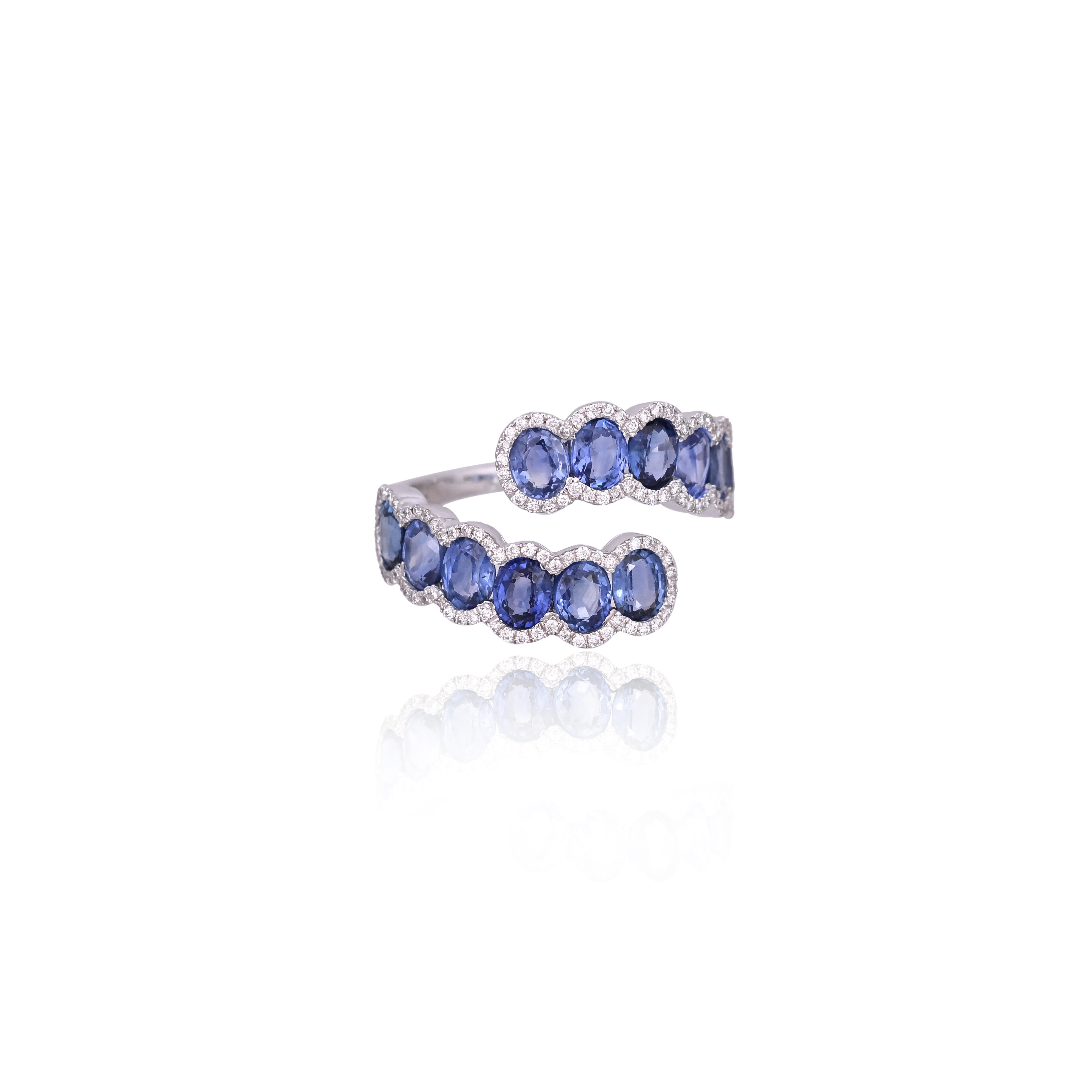 A very gorgeous and beautiful, modern style, Blue Sapphires Band Ring set in 18K White Gold & natural Diamonds. The weight of the Blue Sapphires 3.83 carats. The Blue Sapphires are of Ceylon (Sri Lankan) origin. The Diamonds weight is 0.26 carats.