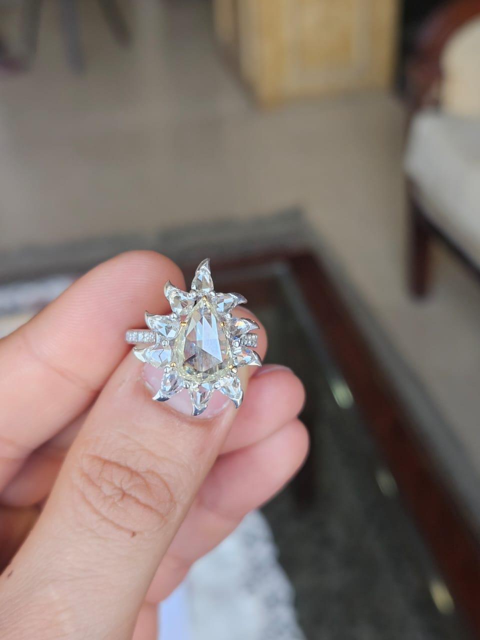 A very gorgeous and beautiful, Art Deco style, Rose Cut Diamonds Engagement Ring set in 18K White Gold & natural Diamonds. The combined Rose Cut Diamonds weight is 3.86 carats. Other Diamonds weight is 0.18 carats. Net 18K Gold weight is 5.30 grams.