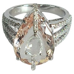 Set in 18K White Gold, 5.59 carats Morganite & Rose Cut Diamonds Engagement Ring
