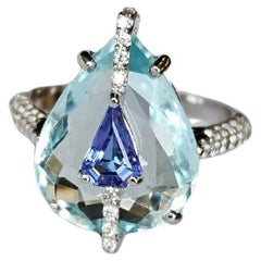 Set in 18K White Gold, 5.61 carats Aquamarine, Tanzanite 
Diamond Cocktail RIng