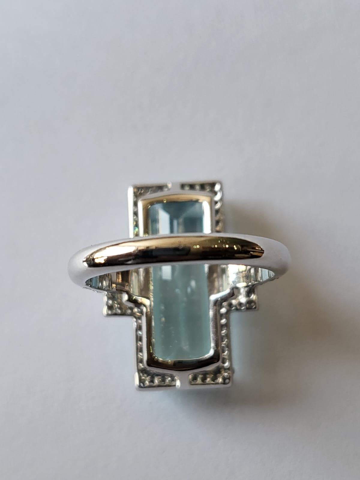 A very gorgeous and one of a kind, Aquamarine Engagement Ring set in 18K White Gold & Diamonds. The weight of the Aquamarine is 7.43 carats. The combined weight of the Diamonds is 1.02 carats. Net Gold weight is 5.51 grams. The dimensions of the