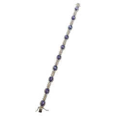 Set in 18K white Gold, 8.02 carats, Tanzanites & Diamonds Tennis Bracelet