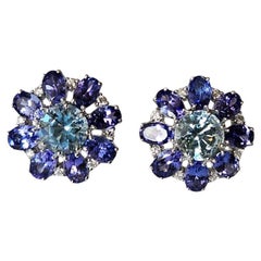 Set in 18K white Gold, 8.16 carats Tanzanite, Aquamarine & Diamond Stud Earrings