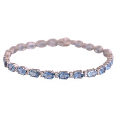 Set in 18k White Gold 8.90 Carats, Natural Aquamarine & Diamonds Tennis Bracelet