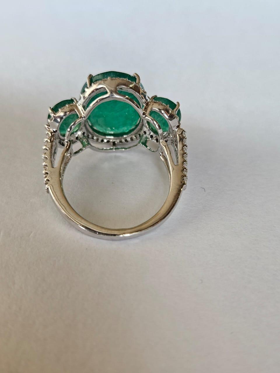 Set in 18K white Gold, 9.13 carats,  Zambian Emerald & Diamonds Engagement Ring For Sale 3