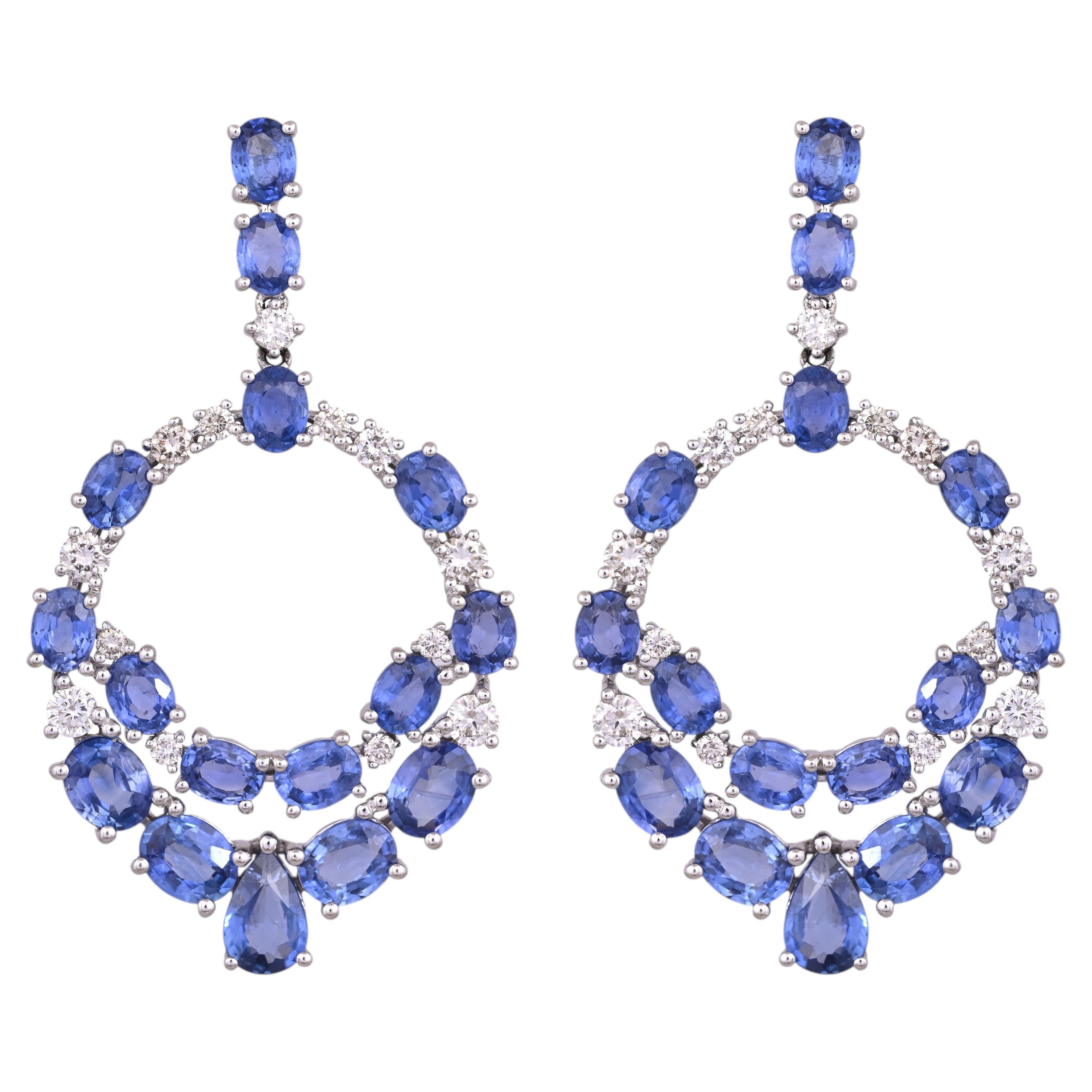 Set in 18K white Gold, 9.90 carats, Blue Sapphires & Diamonds Dangle Earrings