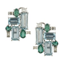 Set in 18k white gold, Aquamarine, Emerald and Baguette Diamonds stud Earrings