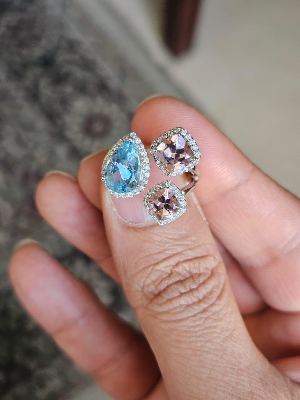 A very gorgeous and beautiful, modern style Aquamarine & Morganite Cocktail Ring set in 18K White Gold & natural Diamonds. The weight of the Aquamarine is 1.81 carats. The weight of the Morganites is 1.37 carats. The Diamonds weight is 0.41 carats.