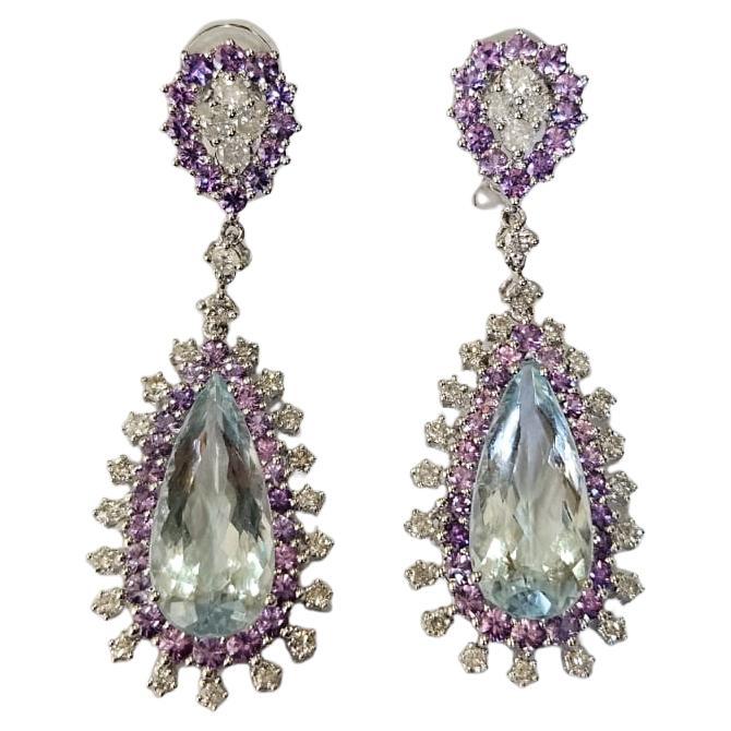 Set in 18K white Gold, Aquamarines, Purple Sapphires 
Diamonds Dangle Earrings