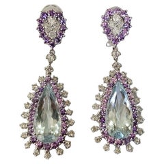 Set in 18K white Gold, Aquamarines, Purple Sapphires 
Diamonds Dangle Earrings