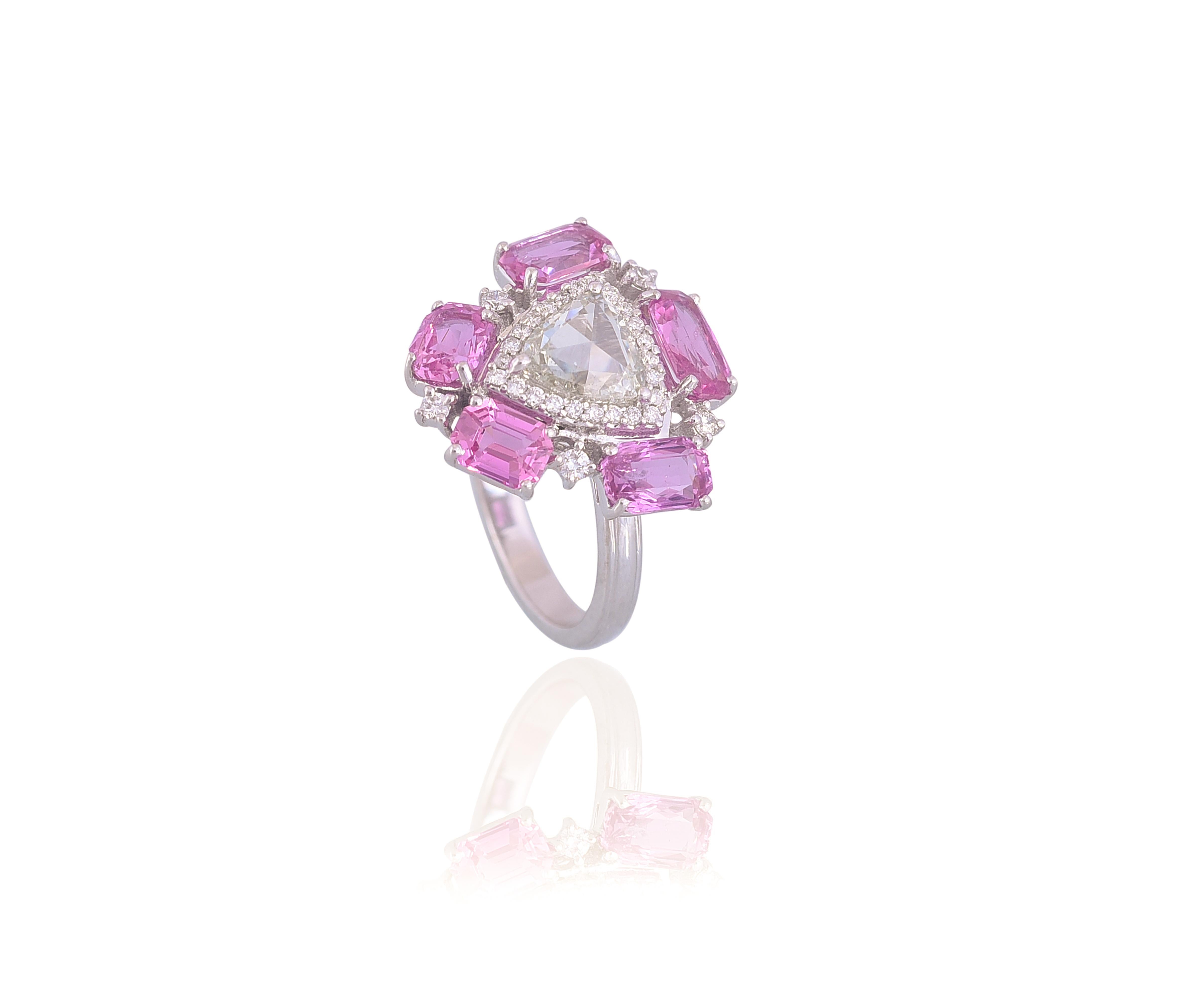 A gorgeous and very apt for the holidays Pink Sapphire & Rose Cut Diamonds cocktail ring set in 18K gold & Diamonds. The combined weight of the diamonds is 1.09 carats. The weight of the Pink Sapphires is 3.29 carats. The Pink Sapphires are natural,
