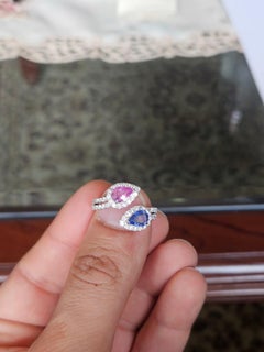 Set in 18K white Gold, Blue Sapphire, Pink Sapphire & Diamonds Engagement Ring
