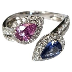 Set in 18K white Gold, Blue Sapphire, Pink Sapphire & Diamonds Engagement Ring