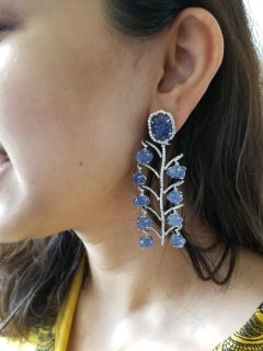 Set in 18 Karat White Gold, Carved Blue Sapphire Dangling Earrings with Diamonds