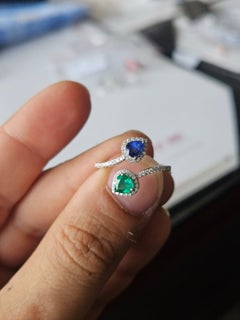 Set in 18K White Gold, Emerald, Blue Sapphire & Diamonds Engagement Ring