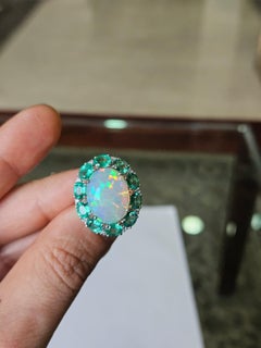 Set in 18K white Gold, Ethiopian Opal, Zambian Emeralds & Diamonds Cocktail RIng