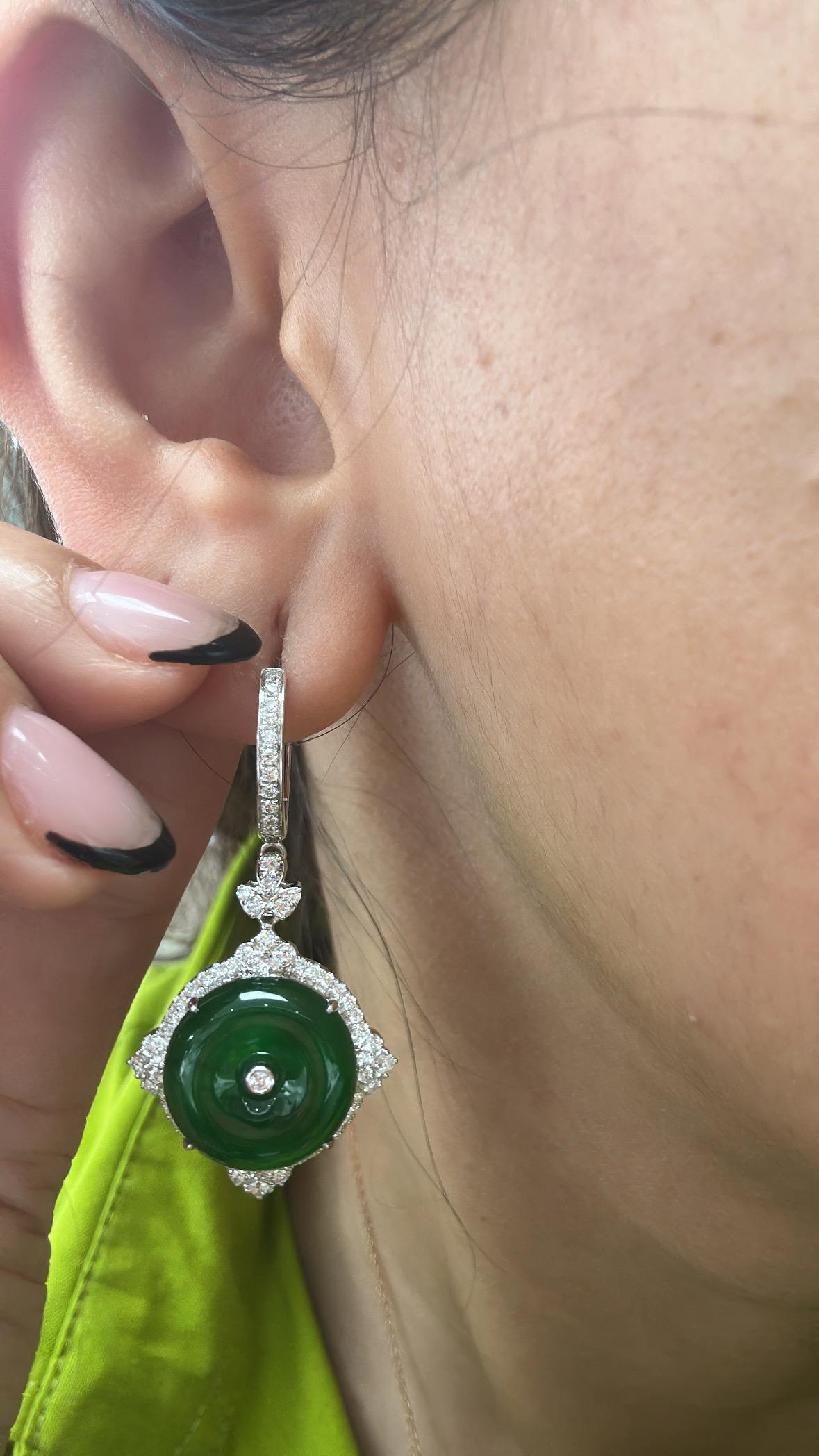 A very gorgeous and beautiful, classic style, Jade Dangle Earrings set in 18K White Gold & natural Diamonds. The weight of the Jadeite Jade is 11.75 carats. The Jade is of natural colour, without any resin. The Diamonds weight is 0.88 carats. Net