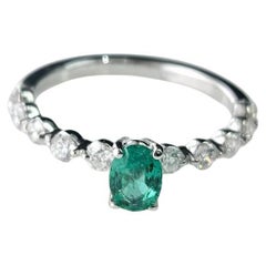 Set in 18K white Gold, natural Colombian Emerald & Diamond Engagement Ring
