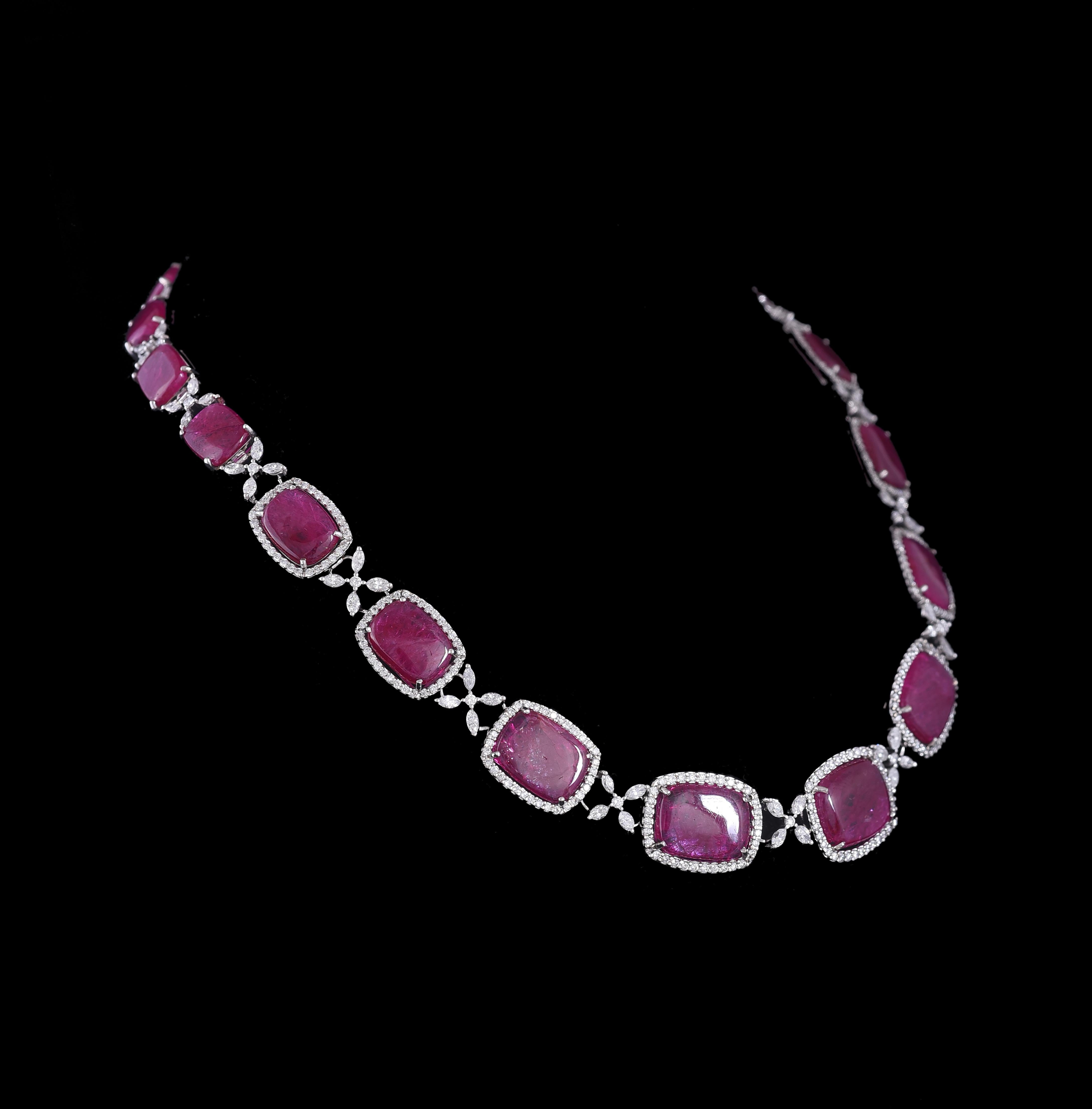 A very simple yet wearable Ruby Necklace Set in 18K White gold & Diamonds. The Necklace set consists of a pair of simple Ruby Earrings and a Ruby Necklace. All the Rubies in the Necklace set are completely natural without any treatment and originate